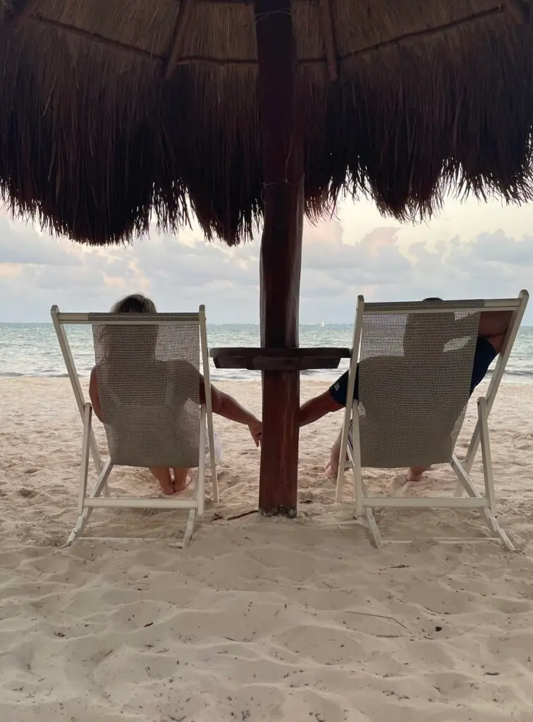 holding hands and watching the waves