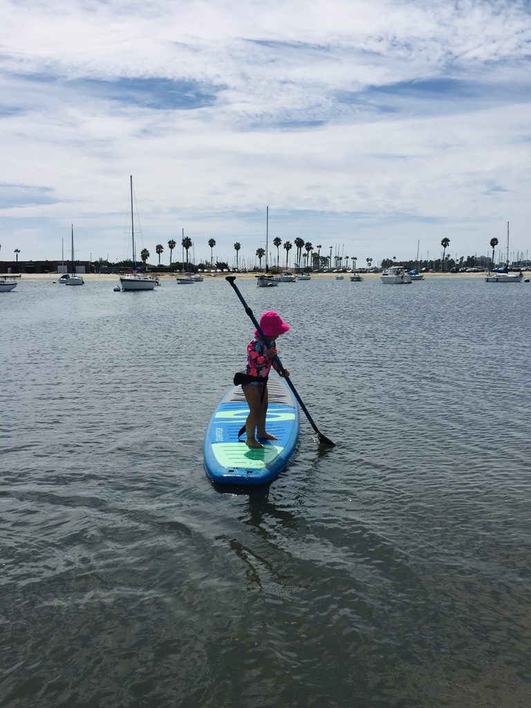 paddleboarding on the bay